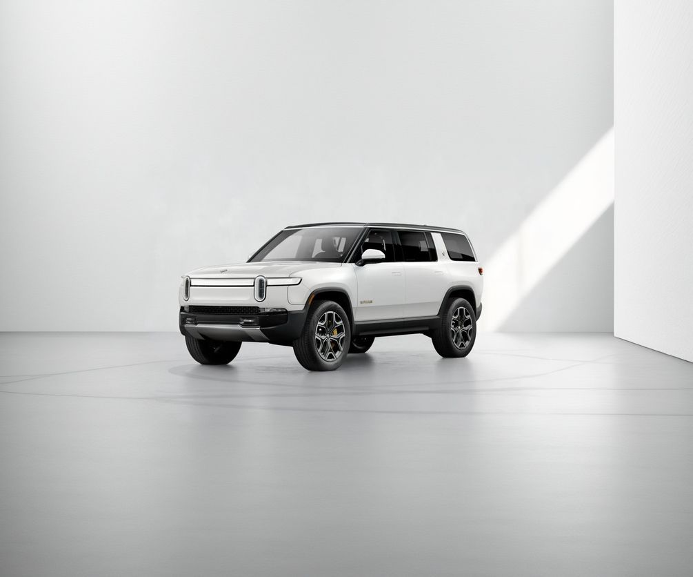 White Rivian SUV