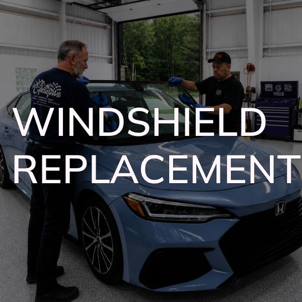 auto-technicians-doing-windshield-replacement-Heritage-Collision-Ann-Arbor