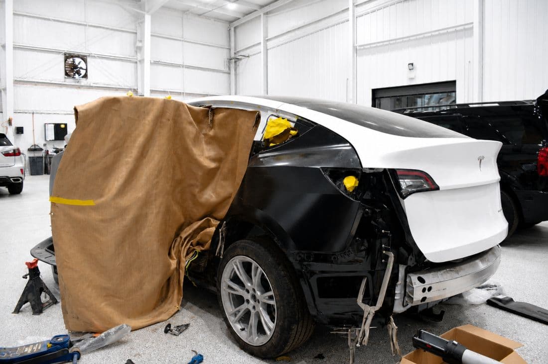 Tesla vehicle in auto body structure repair at Heritage Collision Ann Arbor Certified Tesla body shop Tesla-vehicle-in-auto-body-structure-repair-at-Heritage-Collision-Ann-Arbor-Certified-Tesla-body-shop