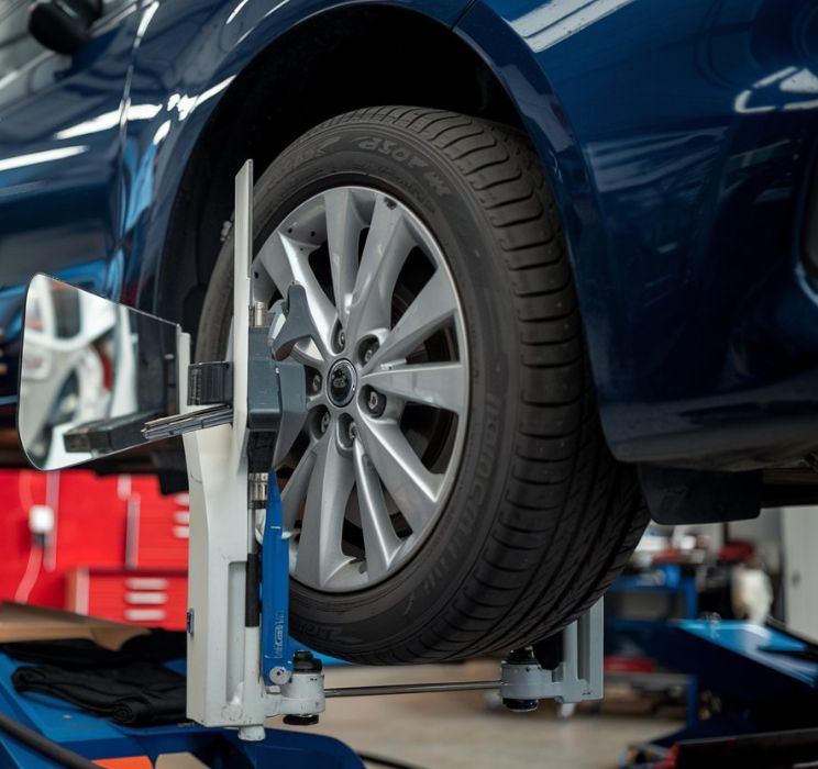 Vehicle getting an alignment FCA Certified Collision Repair at Heritage Collision Ann Arbor Canton Vehicle-getting-an-alignment-FCA-Certified-Collision-Repair-at-Heritage-Collision-Ann-Arbor-Canton